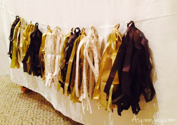 paper tassel garland- pretty yet inexpensive decoration... a little tedious though