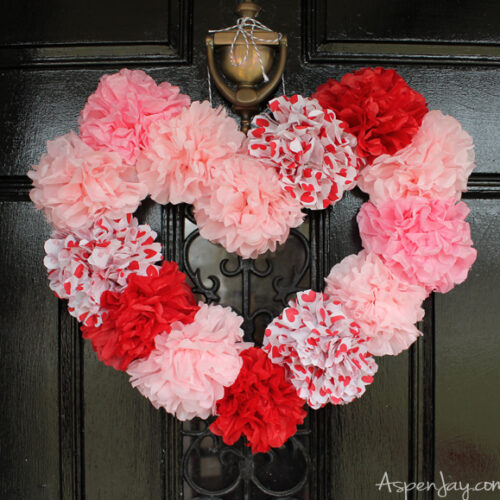 Tissue paper heart wreath tutorial. Inexpensive and pretty heart craft to make for Valentines. Super cute!