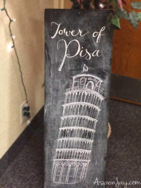 Fun and festive Italian Themed Dinner Party! LOVE the wine bottles and all the little touches! What a great idea for a party! Love the tower of Pisa chalkboard art!