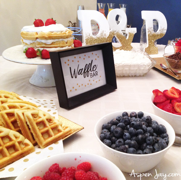 Bridal Shower Waffle Bar. What a cute idea for a bridal shower or a baby shower! Everyone would love this! Super cute ideas for the table layout. Definitely PIN this!