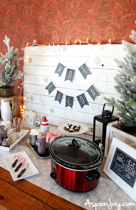 Love all the decor of this hot cocoa bar. This would be perfect for any winter themed party! It's full of great ideas and comes with free printables! Definitely going to try this this year!