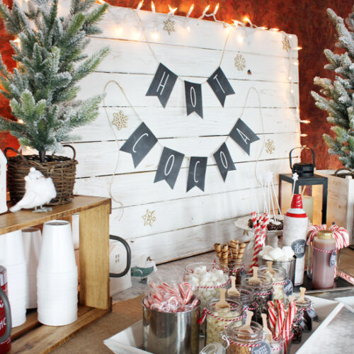 A gorgeous spread of toppings for a hot chocolate bar! This post is full of great ideas for assembling the perfect cocoa bar AND there are lots of free printables!