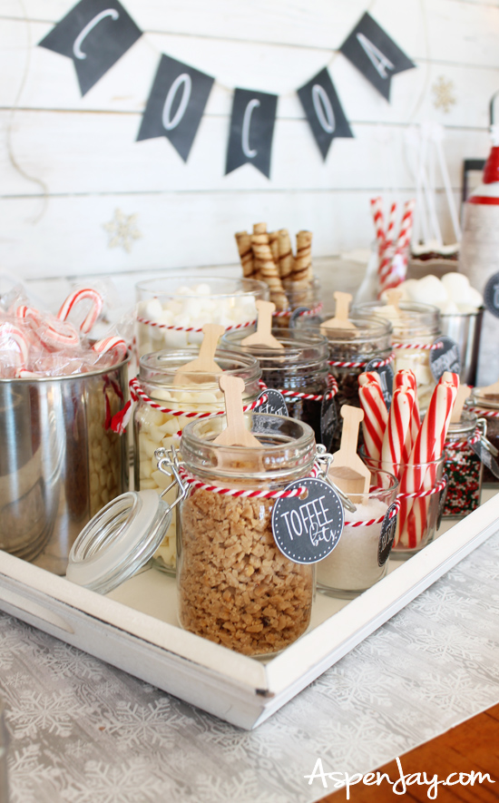 A gorgeous spread of toppings for a hot chocolate bar! This post is full of great ideas for assembling the perfect cocoa bar and has FREE printables! I want to do this next year!