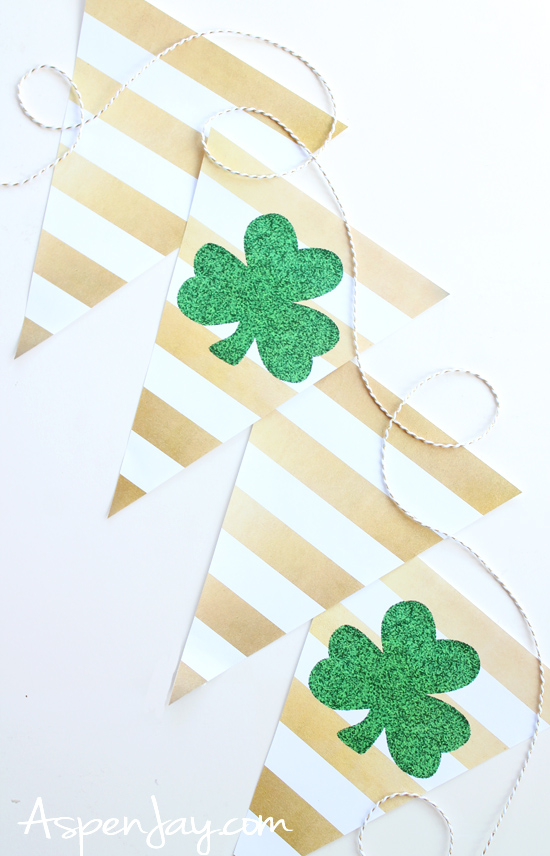 Free shamrock clover banner printable perfect for St. Patrick's Day! Makes it so easy to add a little green to your mantle. #cloverbanner #shamrockbanner #stpatricksday