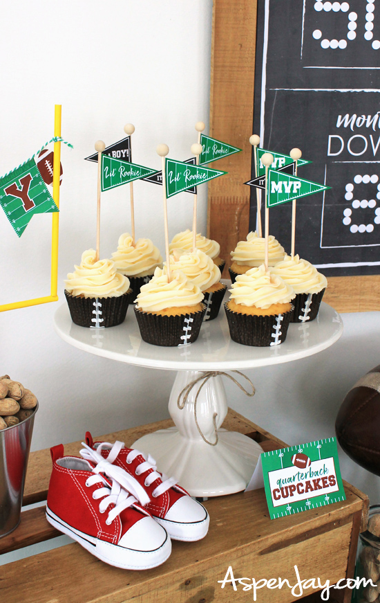 Cute ideas for a sports themed baby shower! Free printable cupcake flags! Perfect finishing touch to your sports themed baby shower! #footballbabyshower #sportsbabyshower #footballflags #footballpennant