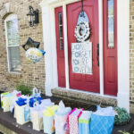 Is covid19 keeping you from throwing a baby shower? Why not surprise the new mama with a doorbell ditch baby shower! Complete with gifts, games, and treats! Let her know she is loved!!! #quarantinebabyshower #surprisebabyshower #babyshowerideas