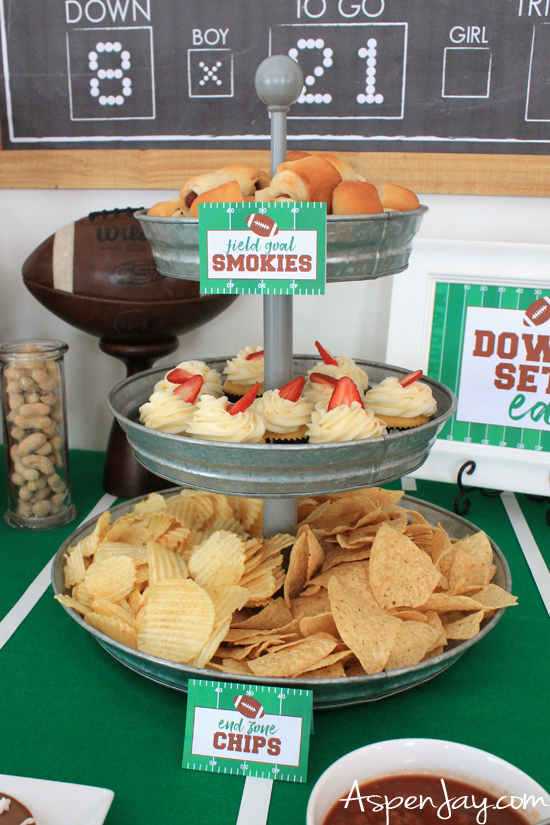 A football food table that will inspire you for your football party! Ideas, tips, and FREE printables! #footballparty #footballfood #superbowlparty