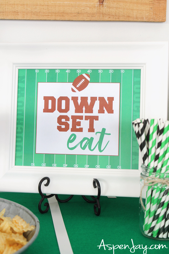 A football food table that will inspire you for your football party! Ideas, tips, and FREE printables! #footballparty #footballfood #superbowlparty