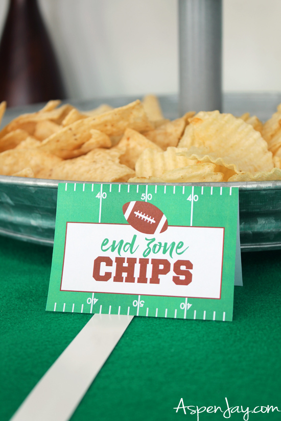 A football food table that will inspire you for your football party! Ideas, tips, and FREE printables! #footballparty #footballfood 