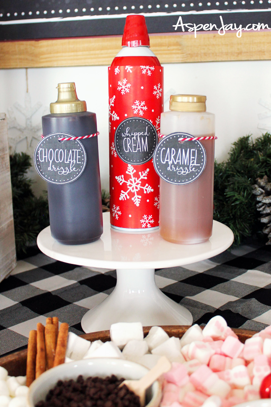 How to create a hot chocolate charcuterie board for your upcoming holiday party! Simple to make and such a great addition to your hot cocoa bar. Helpful tips and free printables included! #hotcocoabar #hotchocolatebar #hotcocoadessertboard