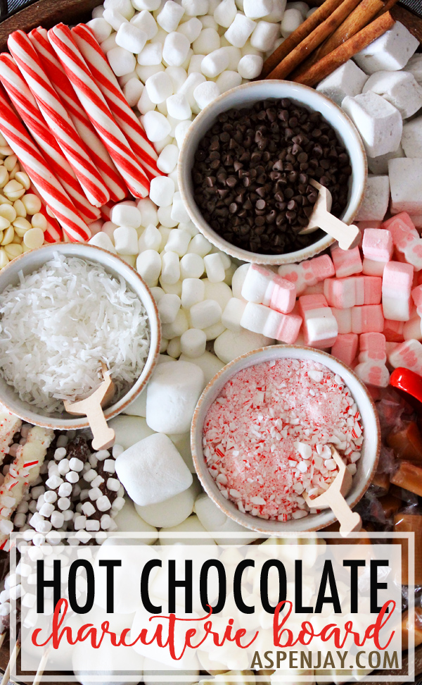 How to make a hot chocolate charcuterie board for your upcoming holiday party! Simple to make and such a great addition to your hot cocoa bar. Helpful tips and free printables included! #hotcocoabar #hotchocolatebar #hotcocoadessertboard