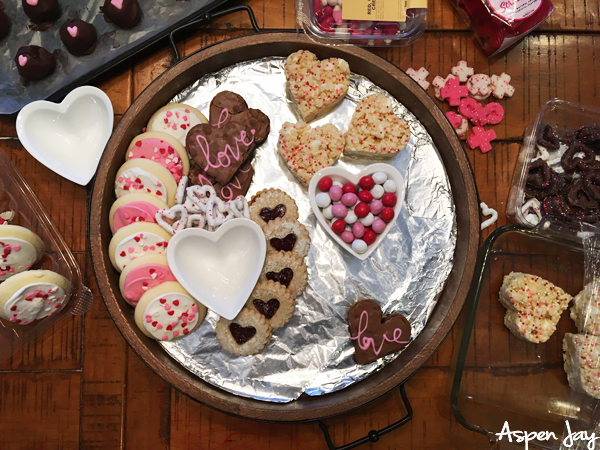 Impress your party guests by designing a Valentine's Charcuterie Board for February 14th to celebrate the day of love. These tips will help you confidently make your own. #valentinescharcuterieboard #valentinesdessertboard