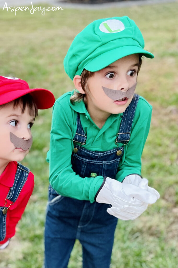 Need a fun and easy family costume theme for Halloween? Level up with these DIY Super Mario Family Costumes!