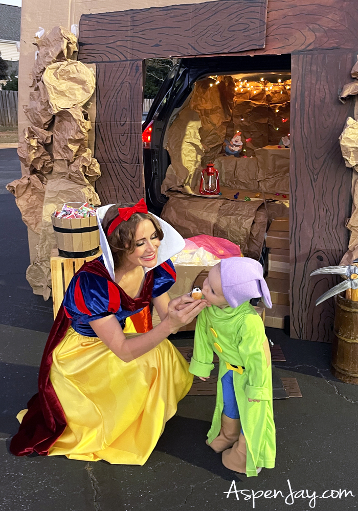 Individuals dressed up as Snow White and Dopey. Post all about Snow White and the Seven Dwarfs family costumes for Halloween.