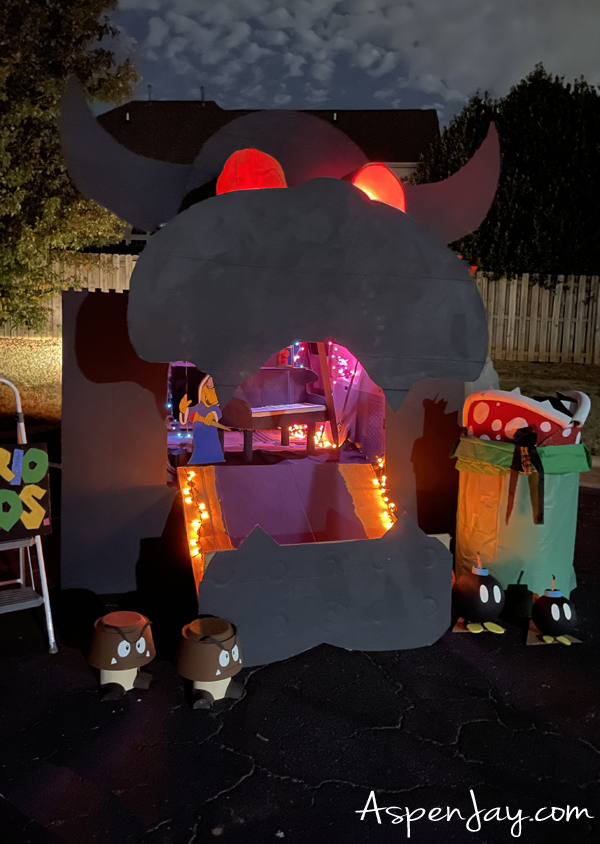 Super Mario Trunk - Bowser's castle all lit up at night.