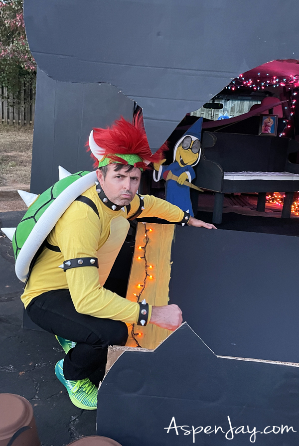 Bowser in all his glory in front of his castle.