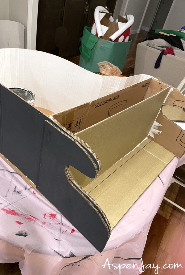Creating a Baby Grand Piano out of cardboard for a prop in a Super Mario Trunk of Bowser's Castle! 