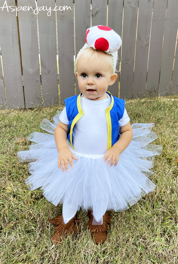Transform your little one into the cutest Toad in the Mushroom Kingdom! This DIY Toad costume for girls is easy, budget-friendly, and includes a mushroom cap, vest, and tutu. Perfect for toddlers or older girls. 